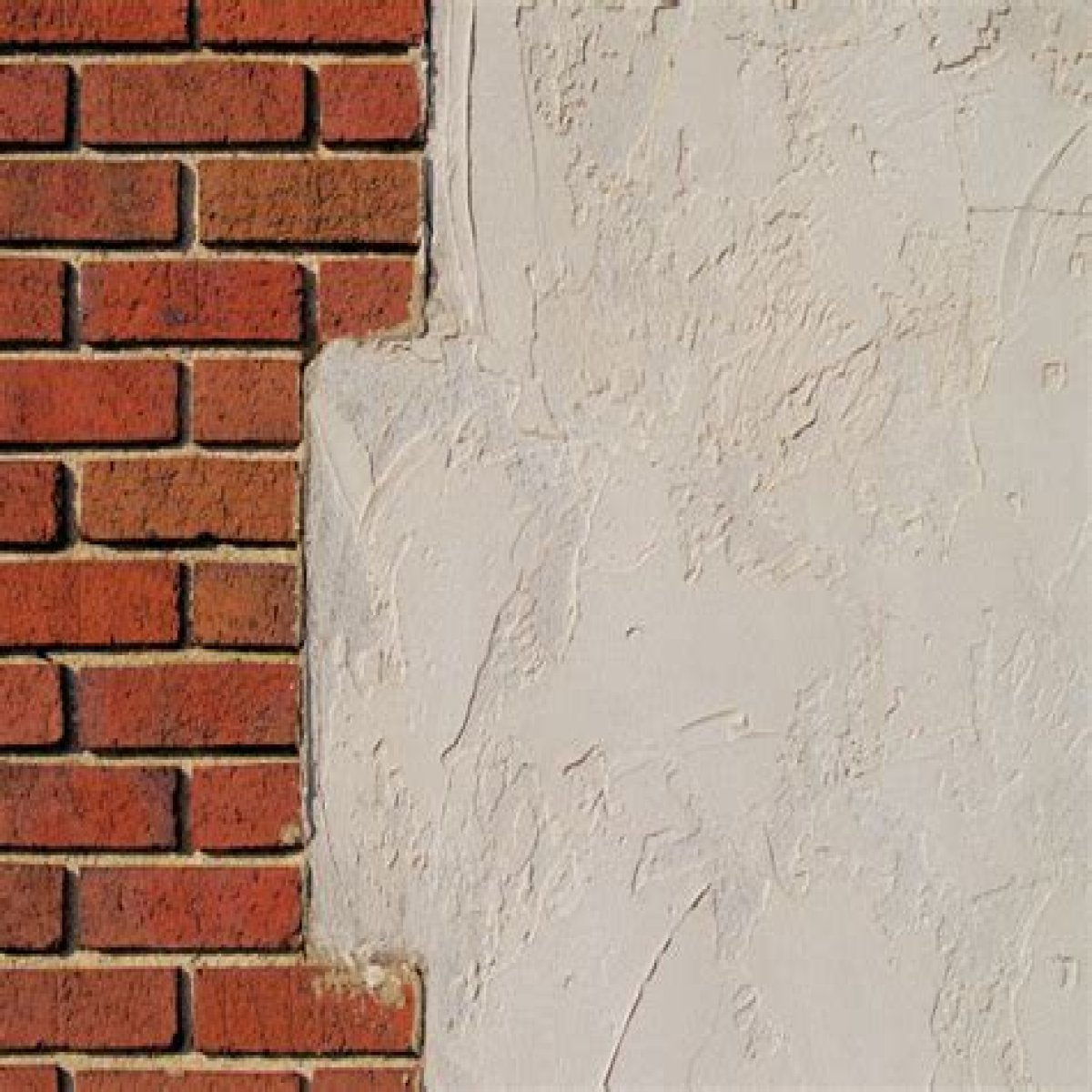 Can you stucco over brick chimney?