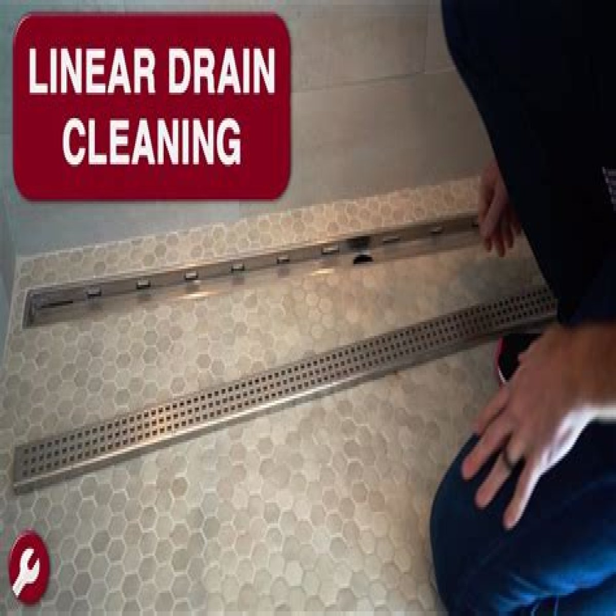 How do you clean a linear drain?