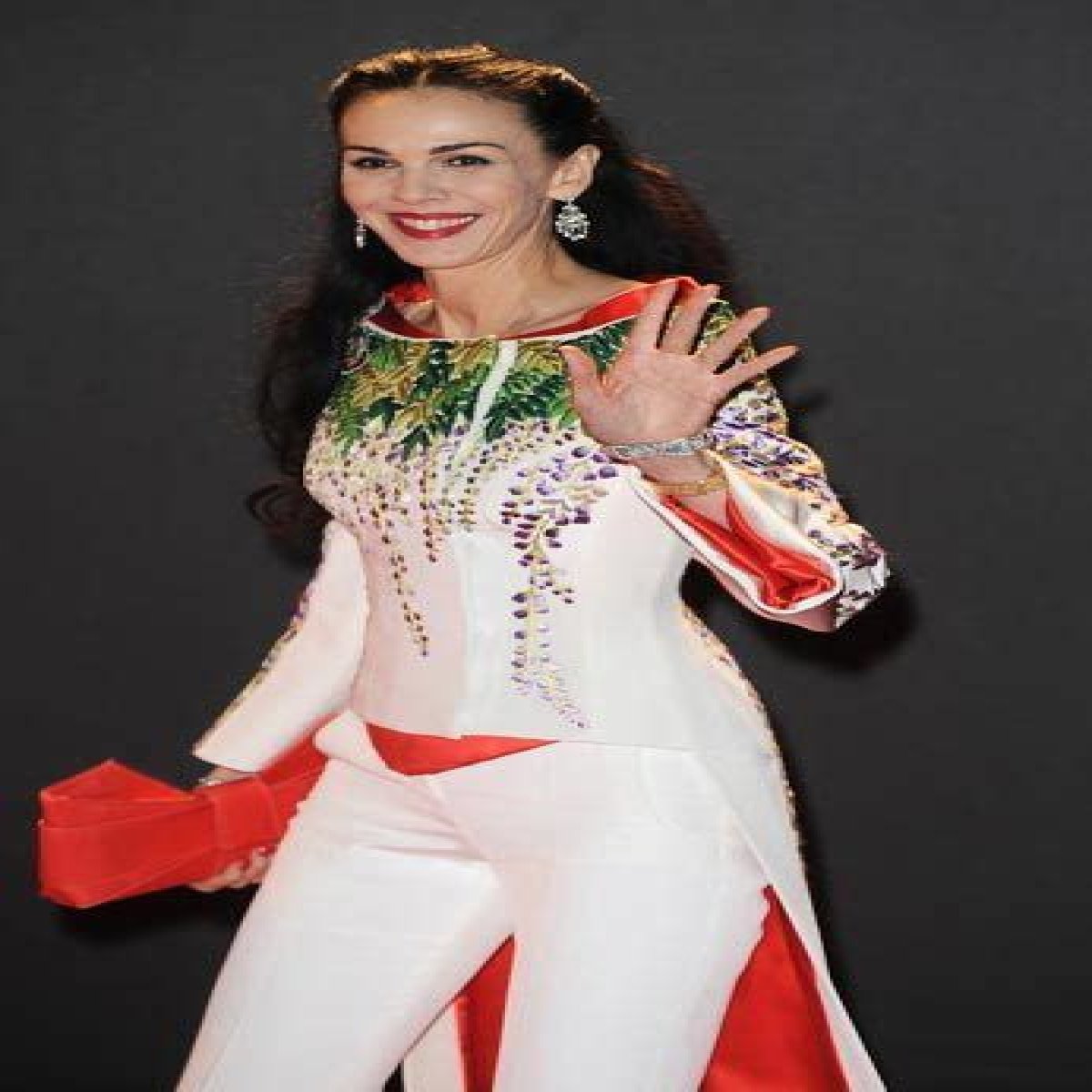 L'Wren Scott's ashes have been split between family and Mick Jagger