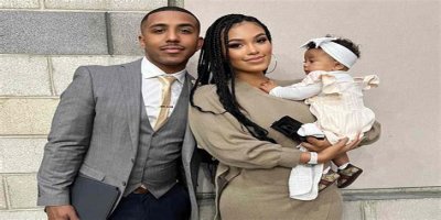 Marques Houston's Wife Miya Displays Her Flawless Figure in a Long White Dress with a High Slit