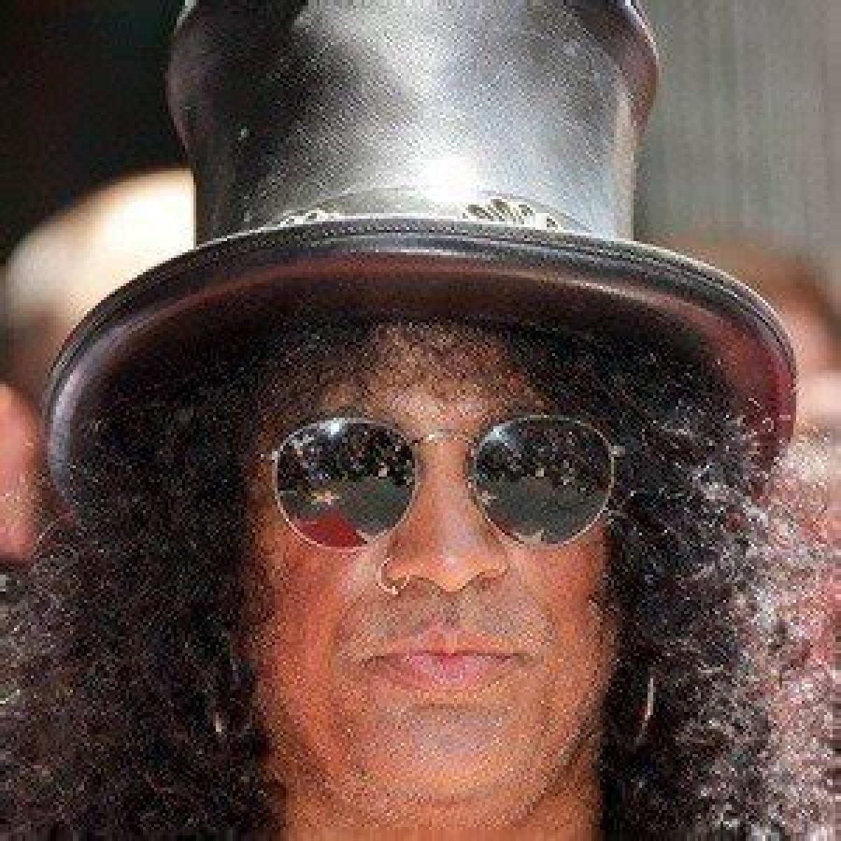Slash (Guitarist) - Age, Birthday, Bio, Facts, Family, Net Worth, Height & More